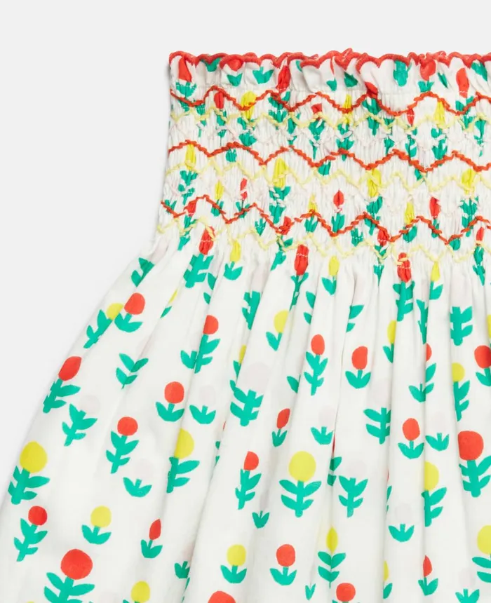 Stella McCartney Dreamy Flower Print Smocked Skirt Ivory Multicolour Kids Pants and Shorts Stella McCartney Dreamy Flower Print Smocked Skirt Ivory Multicolour Kids Pants and Shorts