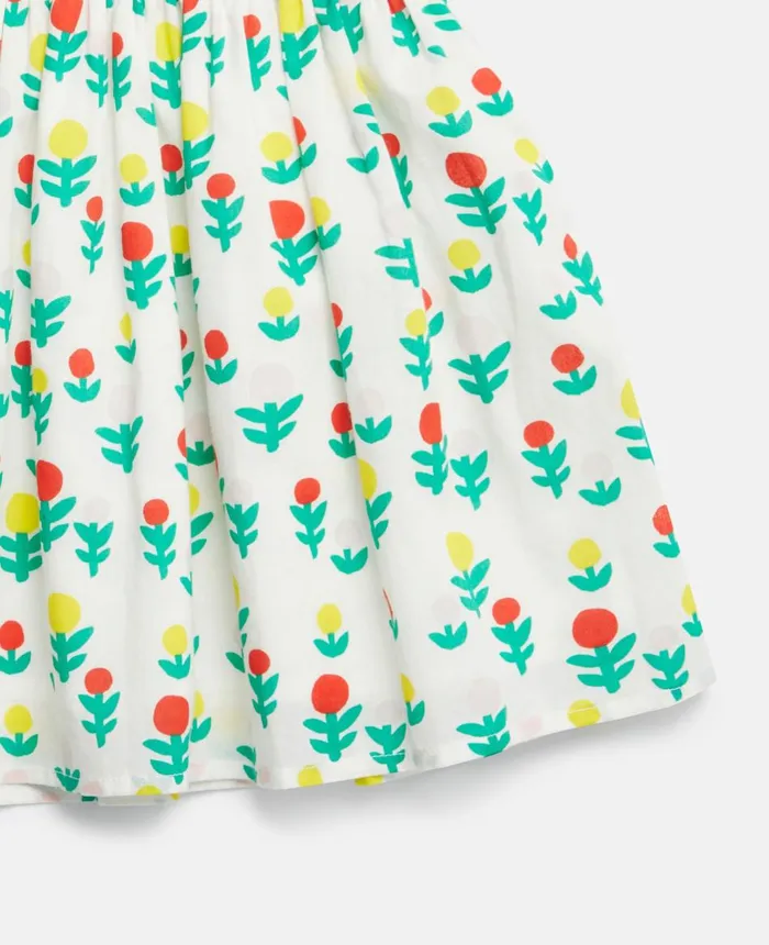 Stella McCartney Dreamy Flower Print Smocked Skirt Ivory Multicolour Kids Pants and Shorts Stella McCartney Dreamy Flower Print Smocked Skirt Ivory Multicolour Kids Pants and Shorts