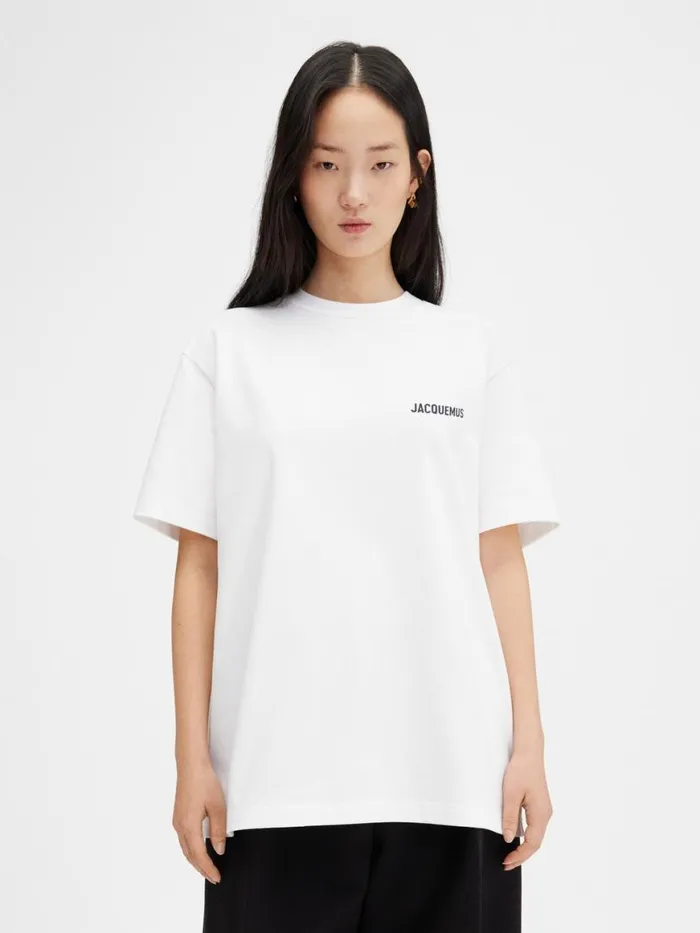 The Saint Tropez Indie Beach Address Tshirt Saint Tropez Indie WomenMen JACQUEMUS Tshirts The Saint Tropez Indie Beach Address Tshirt Saint Tropez Indie WomenMen JACQUEMUS Tshirts
